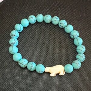 Turquoise colored Beaded Bracelet with Bear Charm